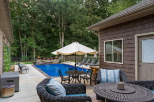 Backyard pool design by Greenscapes Outdoor Living in Madison, AL