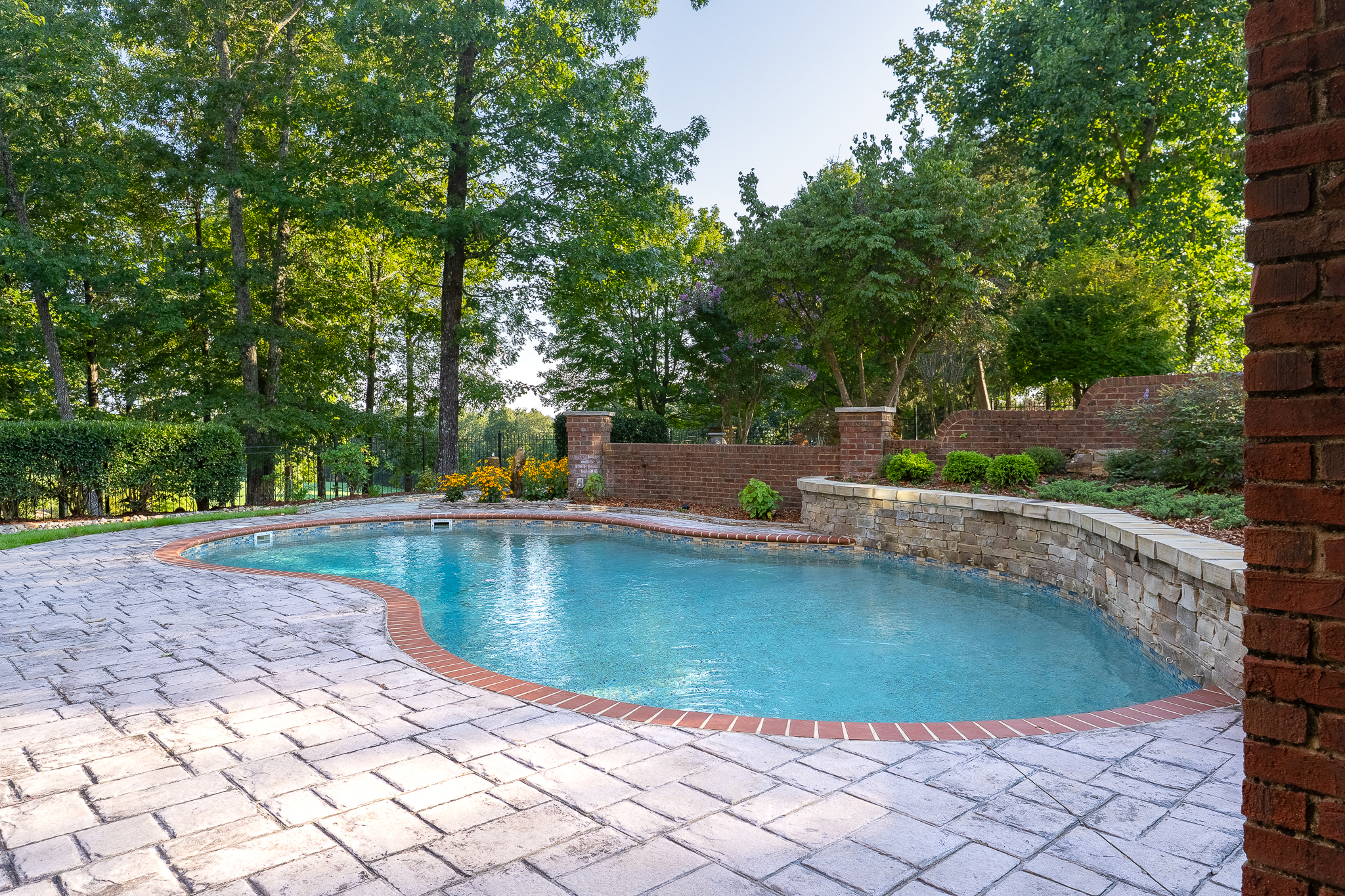 A pool designed by Greenscapes Outdoor Living in Huntsville, AL at the ledges drive